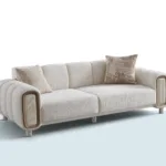 Aura 3’lü kanepe, yumuşak hatlı kol yapısı ve destekli minderleriyle modern üçlü koltuk