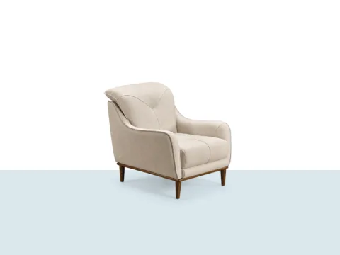 Lion Berjer – modern hatlı, ahşap ayaklı, krem tonlu berjer koltuk