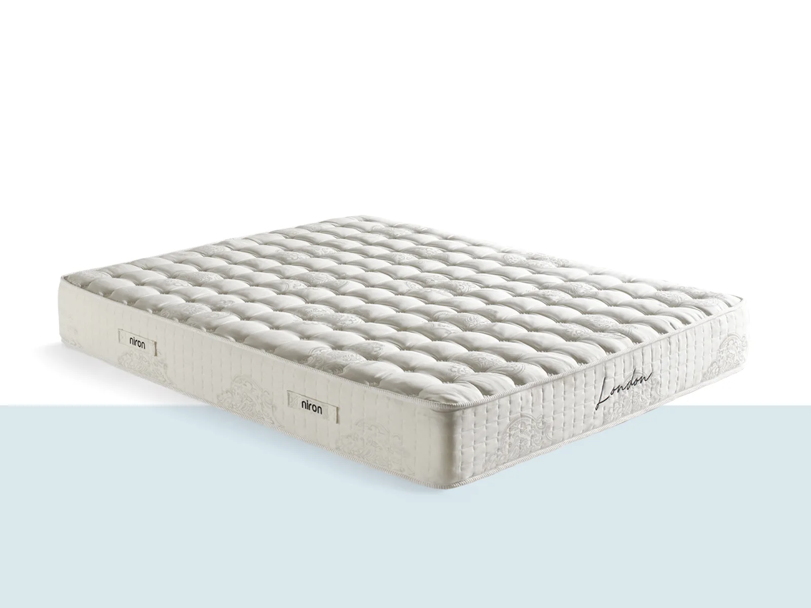 London Yatak – Üst Segment Konfor ve Dengeli Destek Yoğun kapitoneli üst yüzeye sahip, açık tonlu modern London yatak